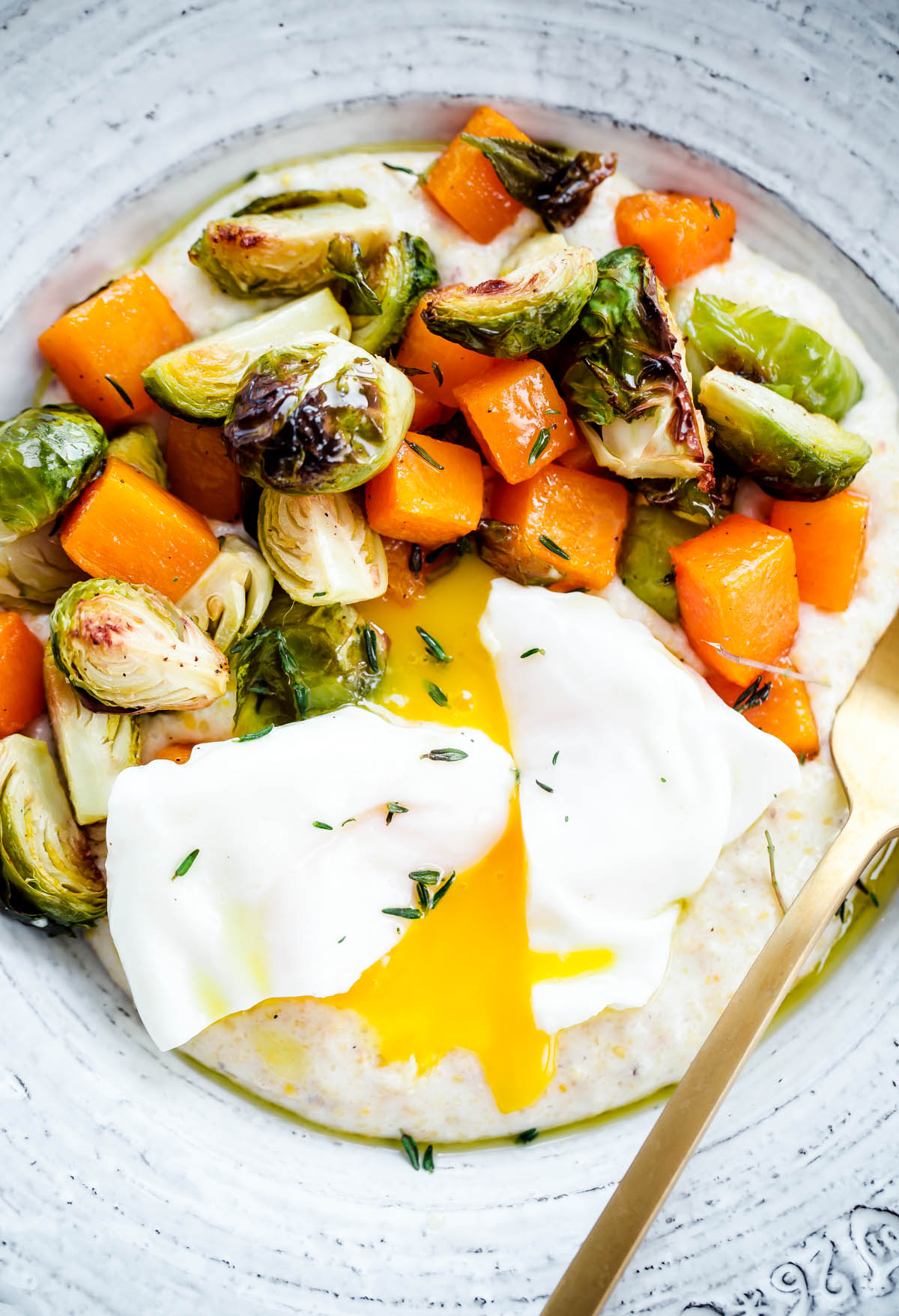 Creamy Goat Cheese Grits with Roasted Brussels Sprouts and Squash and