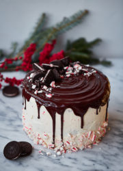 Candy Cane Crunch Cake. Peppermint chocolate layer cake filled with candy cane Swiss meringue buttercream and topped with peppermint ganache. Perfect celebration cake for the holidays!