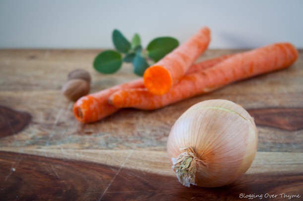 Carrots and Onion on a Cutting Board