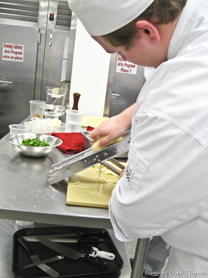 student using mandoline