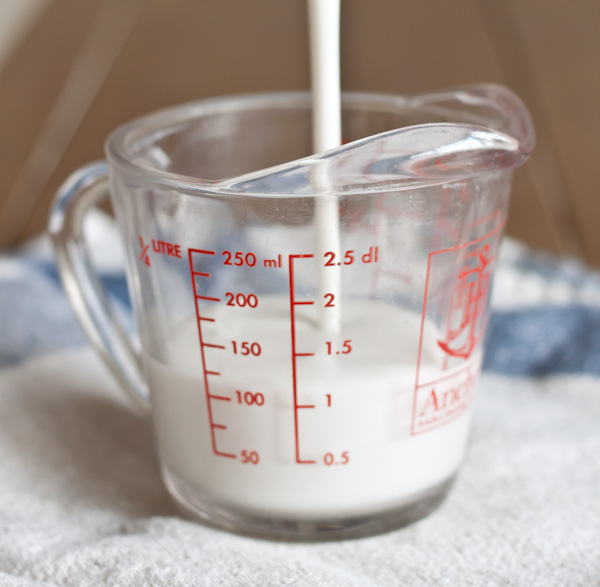 Buttermilk Poured into Measuring Cup