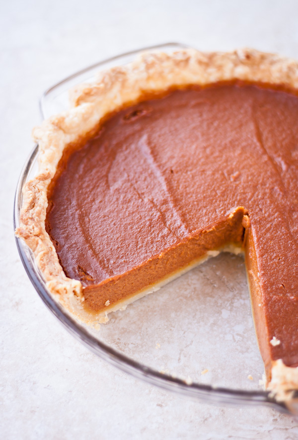 Baked Pumpkin Pie with Wedge Removed