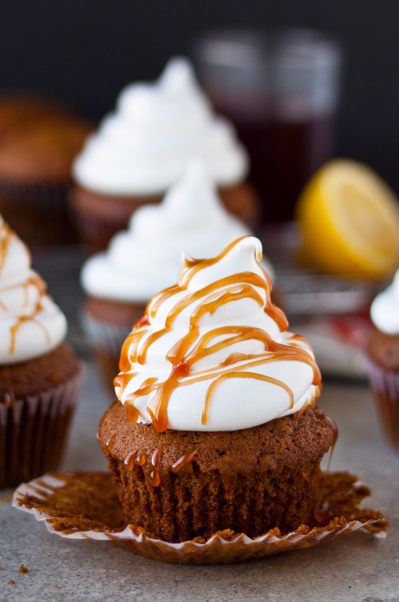 Gingerbread Cupcakes with Marshmallow Frosting and Pomegranate Caramel