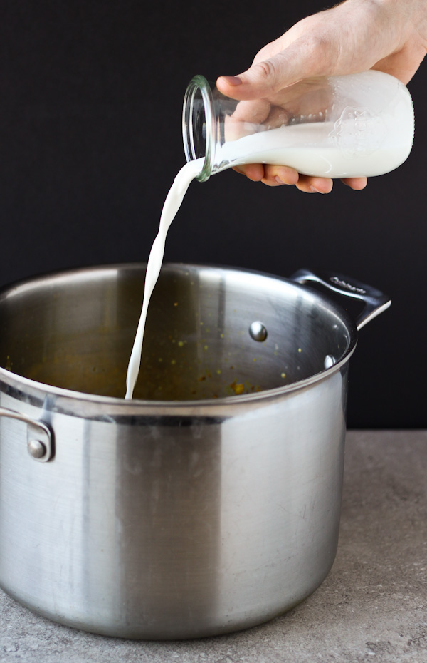 Cream Pouring into Soup Pot