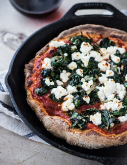 Harissa, Spinach, and Feta Skillet Pizza