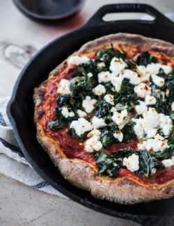 Harissa, Spinach, and Feta Skillet Pizza