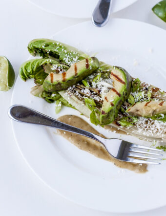 Grilled Romaine Salad with Avocado, Tomatillos, and Cotija Cheese