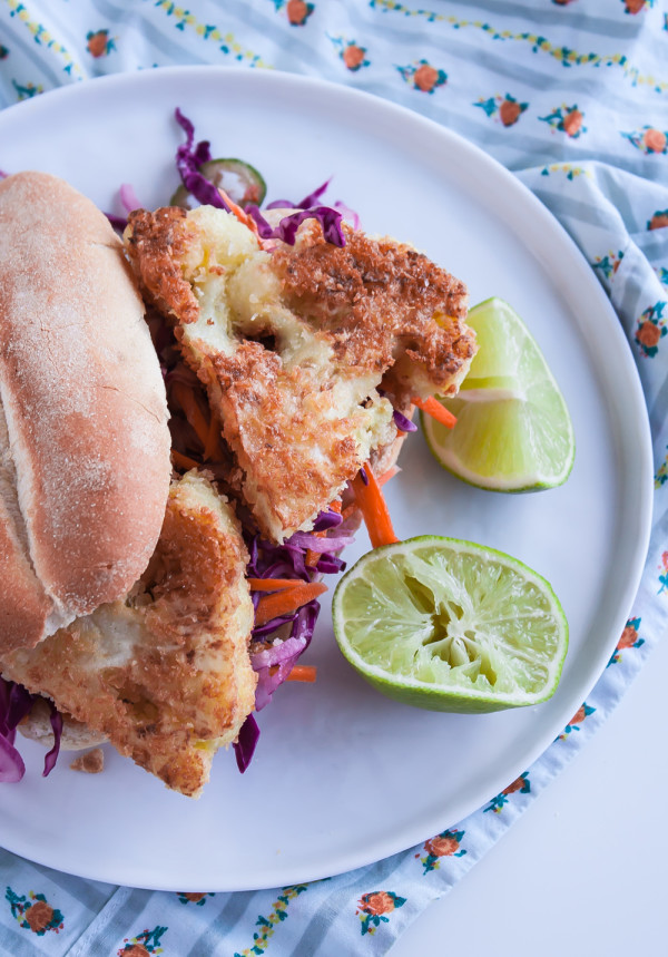 Cauliflower Steak Burger with Tangy Coleslaw. Vegetarian burgers made with breaded cauliflower and paired with fresh coleslaw!