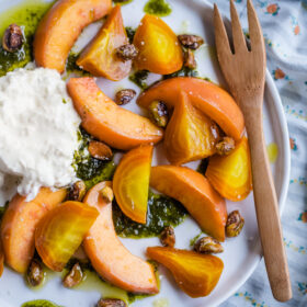 Roasted Beet Peach and Burrata Salad with Basil Oil and Candied Pistachios