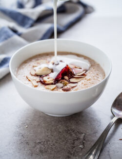 Broken Farro Porridge with Coconut Milk, Almonds, & Roasted Plums