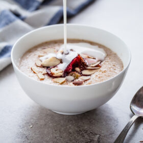 Broken Farro Porridge with Coconut Milk, Almonds, & Roasted Plums