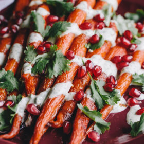 Roasted Carrots with Green Tahini Sauce and Pomegranate