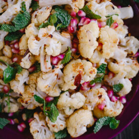 Roasted Cauliflower with Pomegranate Arils, Mint, and Toasted Almonds