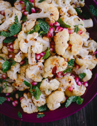 Roasted Cauliflower with Pomegranate Arils, Mint, and Toasted Almonds