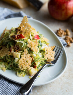 Brussels Sprouts Apple Salad with Walnuts and Cheese Crisps