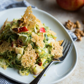 Brussels Sprouts Apple Salad with Walnuts and Cheese Crisps