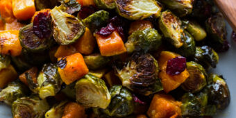 Roasted Brussels Sprouts and Squash with Dried Cranberries and Dijon Vinaigrette -- the perfect side dish for #Thanksgiving!
