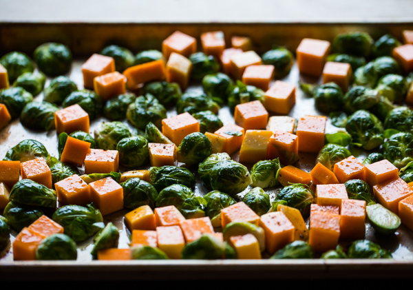 Chopped Brussels Sprouts and Butternut Squash on half sheet pan