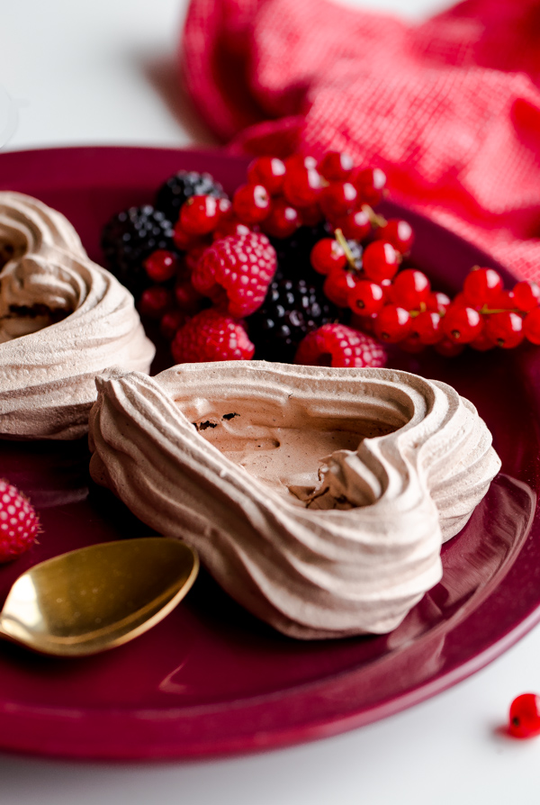 Chocolate Heart Meringue Cups with Whipped Cream and Berries. An elegant, simple dessert for Valentine's Day! 