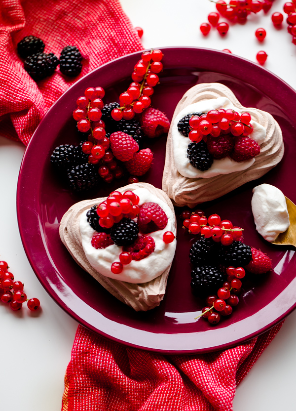 Chocolate Heart Meringue Cups with Whipped Cream and Berries. An elegant, simple dessert for Valentine's Day!
