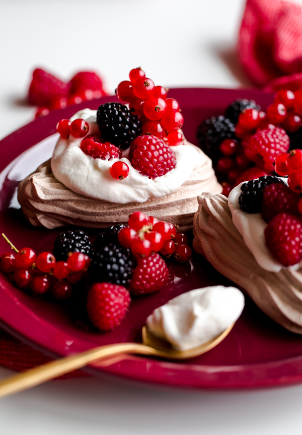 Chocolate Heart Meringue Cups with Whipped Cream and Berries. An elegant, simple dessert for Valentine's Day! 