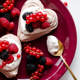 Chocolate Heart Meringue Cups with Whipped Cream and Berries. An elegant, simple dessert for Valentine's Day!