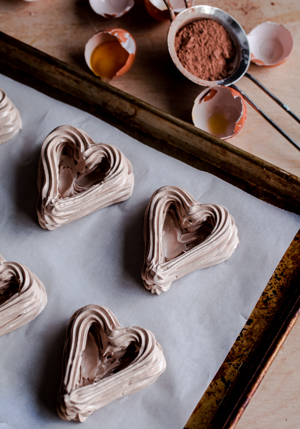 Chocolate Heart Meringue Cups with Whipped Cream and Berries. An elegant, simple dessert for Valentine's Day! 