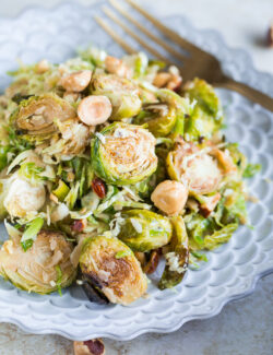 Brussels Sprouts Salad with Hazelnuts Parmesan and Pomegranate Molasses Vinaigrette