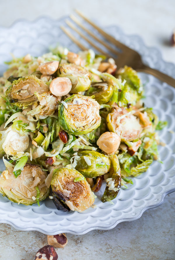 Brussels Sprouts Salad with Hazelnuts Parmesan and Pomegranate Molasses Vinaigrette