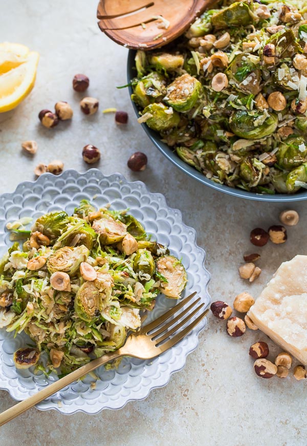 Brussels Sprouts Salad with Hazelnuts Parmesan and Pomegranate Molasses Vinaigrette