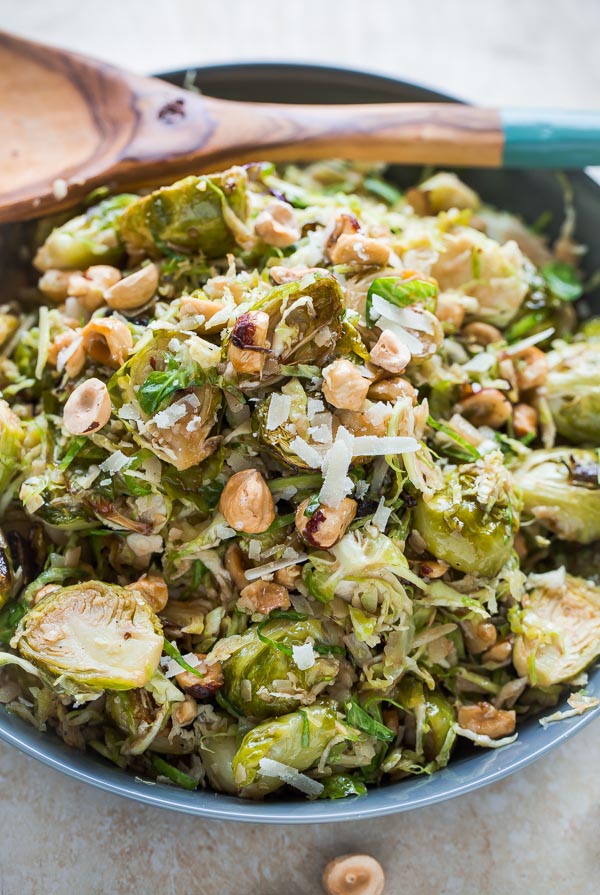 Brussels Sprouts Salad with Hazelnuts Parmesan and Pomegranate Molasses Vinaigrette