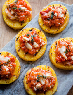 Grilled Polenta Bites with Roasted Red Pepper, Feta, and Thyme
