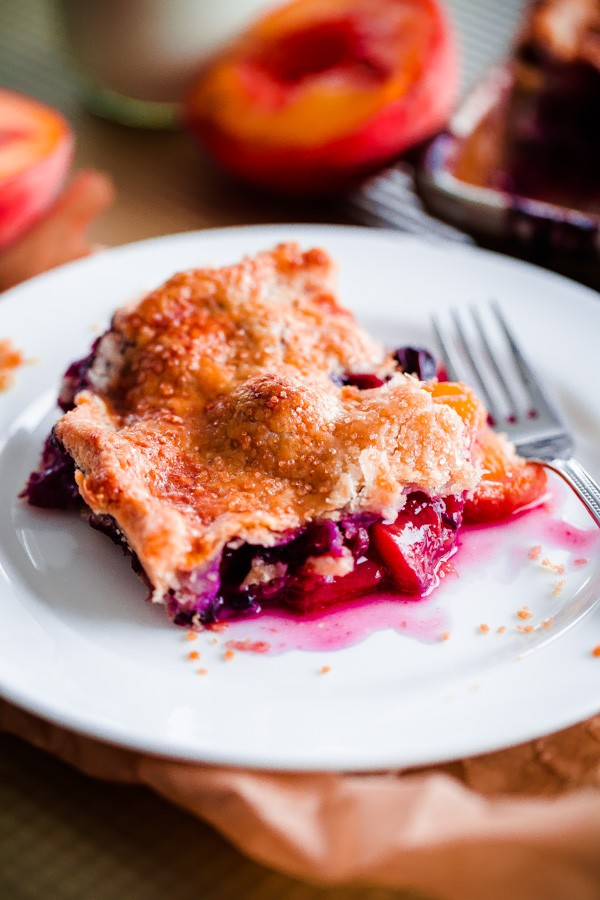 Slice of Blueberry Peach Slab Pie