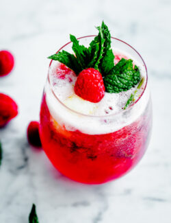 Sorbet Prosecco Floats with Muddled Raspberries and Fresh Mint