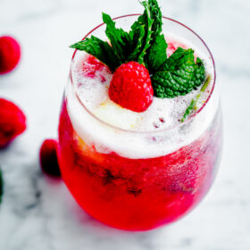 Sorbet Prosecco Floats with Muddled Raspberries and Fresh Mint