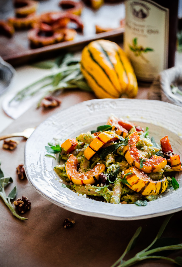 Whole Wheat Pasta with Walnut-Sage Pesto and Roasted Delicata Squash. A delicious, healthy, and EASY fall vegetarian pasta recipe!