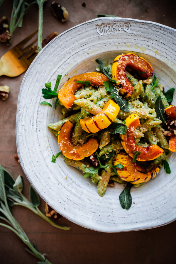 Whole Wheat Pasta with Walnut-Sage Pesto and Roasted Delicata Squash. A delicious, healthy, and EASY fall vegetarian pasta recipe!