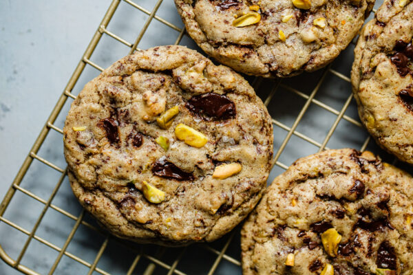 Orange Pistachio Chocolate Chunk Cookies on Rack