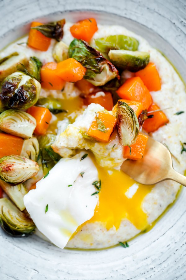 Creamy Goat Cheese Grits with Roasted Brussels Sprouts and Squash and Poached Eggs