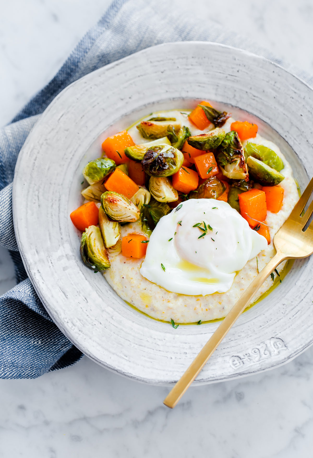 Creamy Goat Cheese Grits with Roasted Brussels Sprouts and Squash and