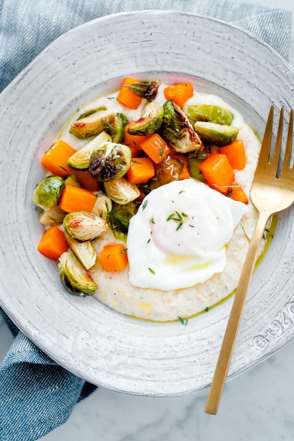 Creamy Goat Cheese Grits with Roasted Brussels Sprouts and Squash and Poached Eggs