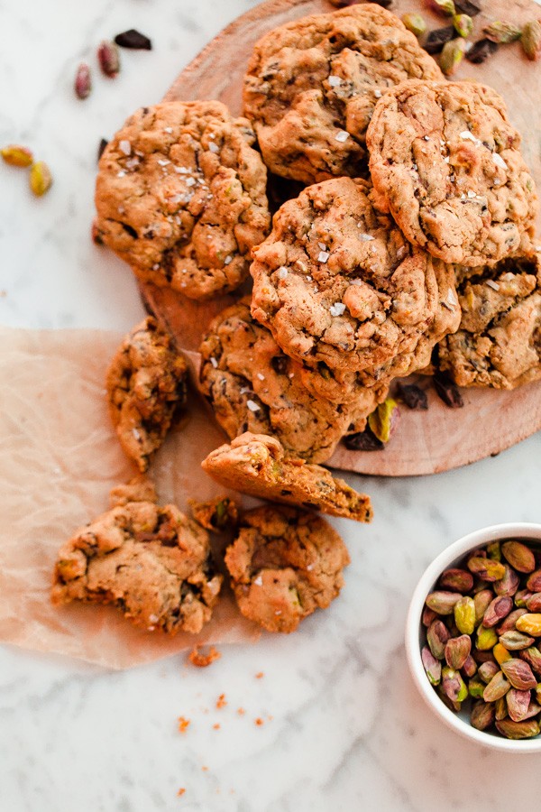 Chewy salted pistachio chocolate chunk cookie recipe infused with fresh orange zest!