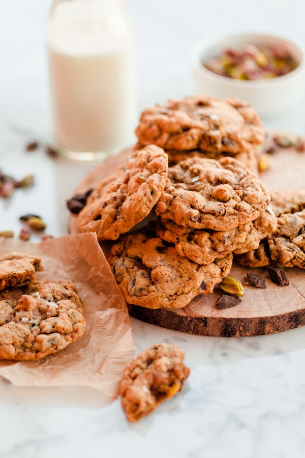 Chewy salted pistachio chocolate chunk cookie recipe infused with fresh orange zest!