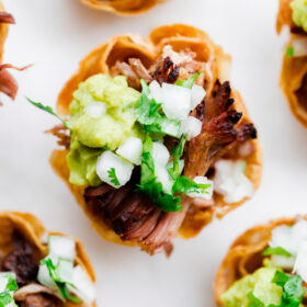 Slow Cooker Carnitas Taco Bites. Perfect for game day weekend!