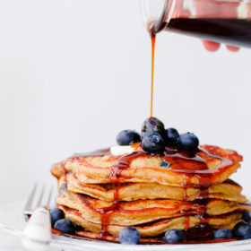 Blueberry Rye Pancakes with 2-Ingredient Molasses Syrup. Fluffy 100% whole grain pancakes filled with fresh blueberries!