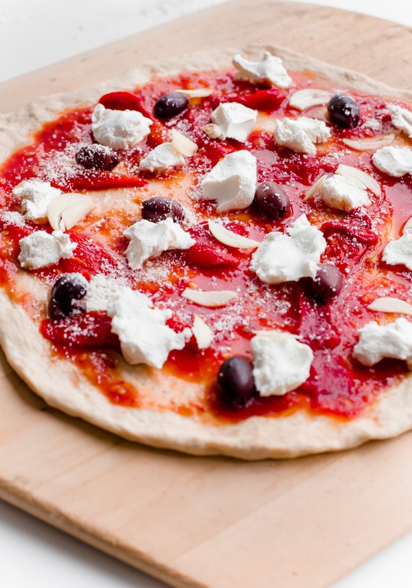 How to Make Spicy Red Pepper, Goat Cheese, Olive, and Arugula Pizza