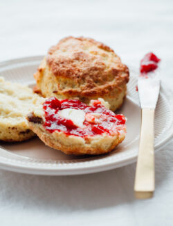 These Irish Soda Bread Scones are fluffy, lightly sweetened, filled with plump golden raisins, and pair perfectly with some butter and jam!