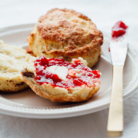 These Irish Soda Bread Scones are fluffy, lightly sweetened, filled with plump golden raisins, and pair perfectly with some butter and jam!