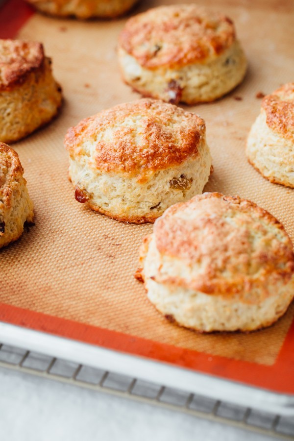 These Irish Soda Bread Scones are fluffy, lightly sweetened, filled with plump golden raisins, and pair perfectly with some butter and jam!