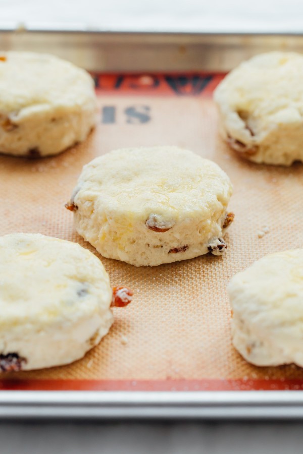 These Irish Soda Bread Scones are fluffy, lightly sweetened, filled with plump golden raisins, and pair perfectly with some butter and jam!